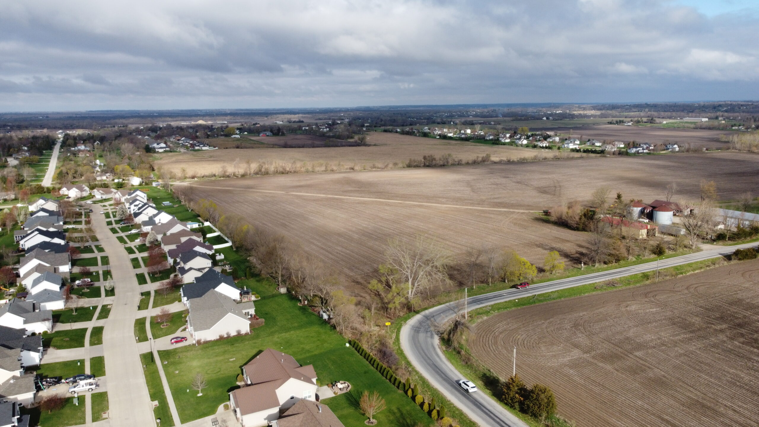 Aerial view of a plot of land being evaluated for a new custom home by TregoCustomHomes during site selection.